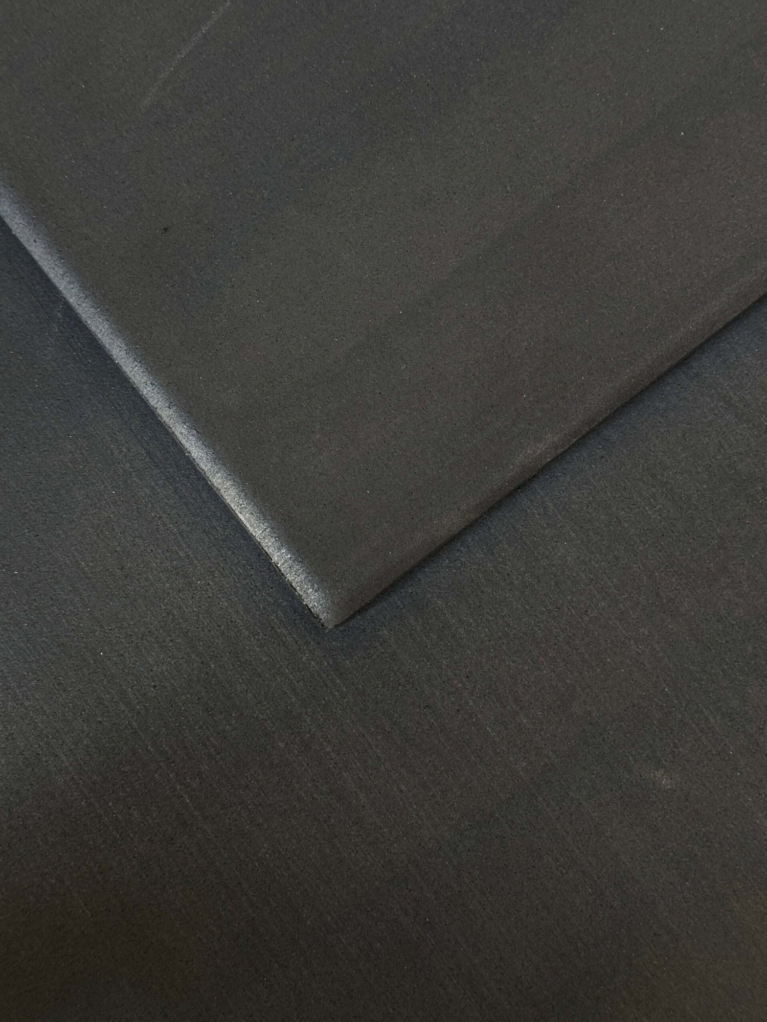 Premium 15mm Black EPDM rubber gym flooring tile, 1m x 1m high-density synthetic rubber for commercial gyms and outdoor training areas.