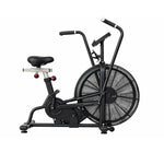 A black air resistance exercise bike with a large front fan, black saddle, and adjustable handlebars, shown from a side profile on a white background.