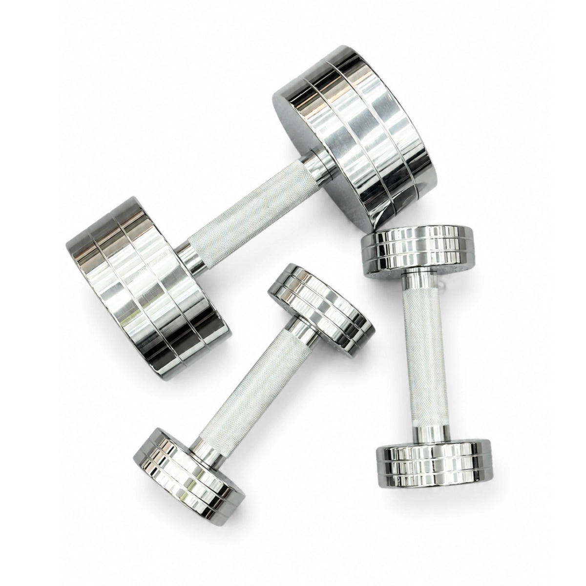 Chrome dumbbells with knurled handles for home and commercial gym strength training.