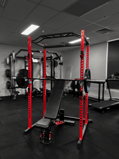 V2 Standard Power Rack: Durable with dual pull-up bars, J-hooks, and safety bars.

30kg All Black Olympic Bumper Plate: High-quality, low-bounce weight plates.

15KG Elite Barbell (500LB Capacity): Perfect for heavy lifts and precision-engineered.

Adjustable Fitness Bench: Versatile for all your strength-training exercises.

