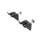 "Matte black heavy-duty steel Barbell Stow Rack bracket mounted to an XG90 gym station frame, securely holding a standard Olympic barbell horizontally off the floor