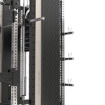 Close-up of the XG90 mirror-polished stainless steel uprights showing numbered adjustment holes and commercial-grade laser-cut numbering