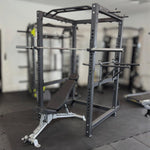 Complete Elite Commercial Power Rack Bundle including 120kg Olympic Bumper Plates, 20kg Barbell, and FID Adjustable Bench for home gyms.